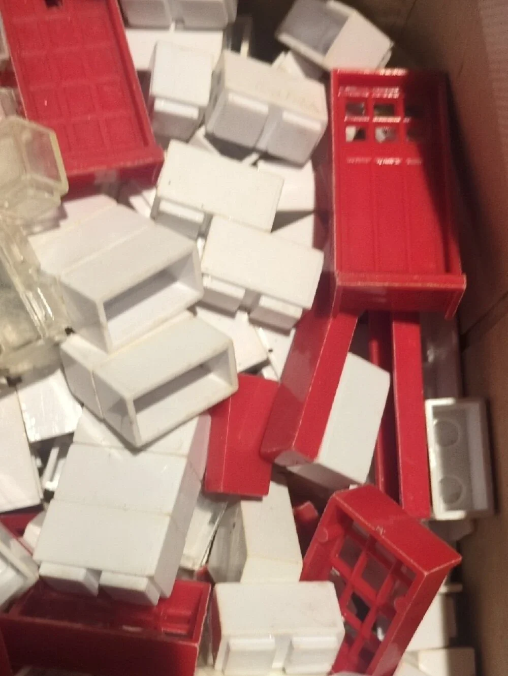 Assorted Kids Building Set Pieces in Red, White, Green, Orange